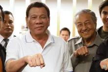 Human Rights Against Populism - Picture: President Rodrigo Duterte and Prime Minister Mahathir Mohamad striking a pose together